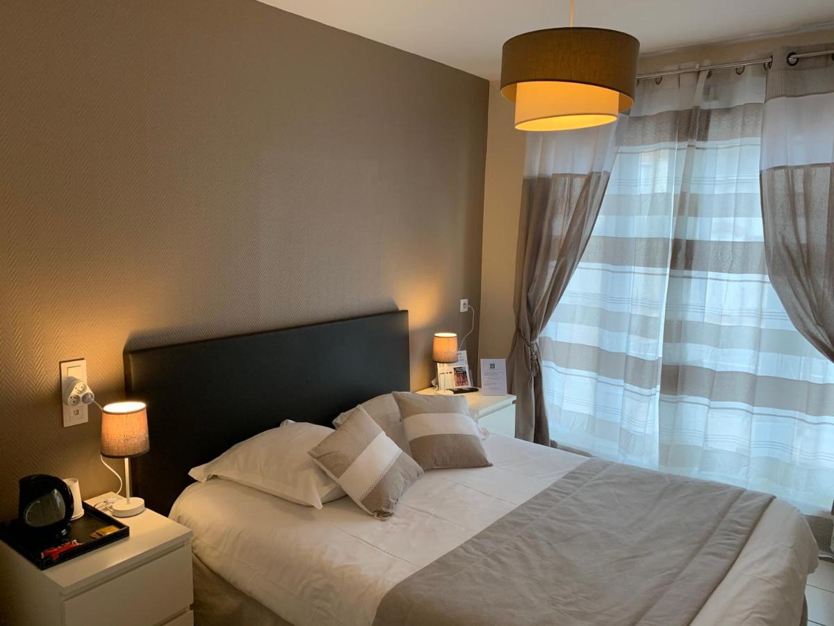 Hotel De La Plage Houlgate Bagian luar foto