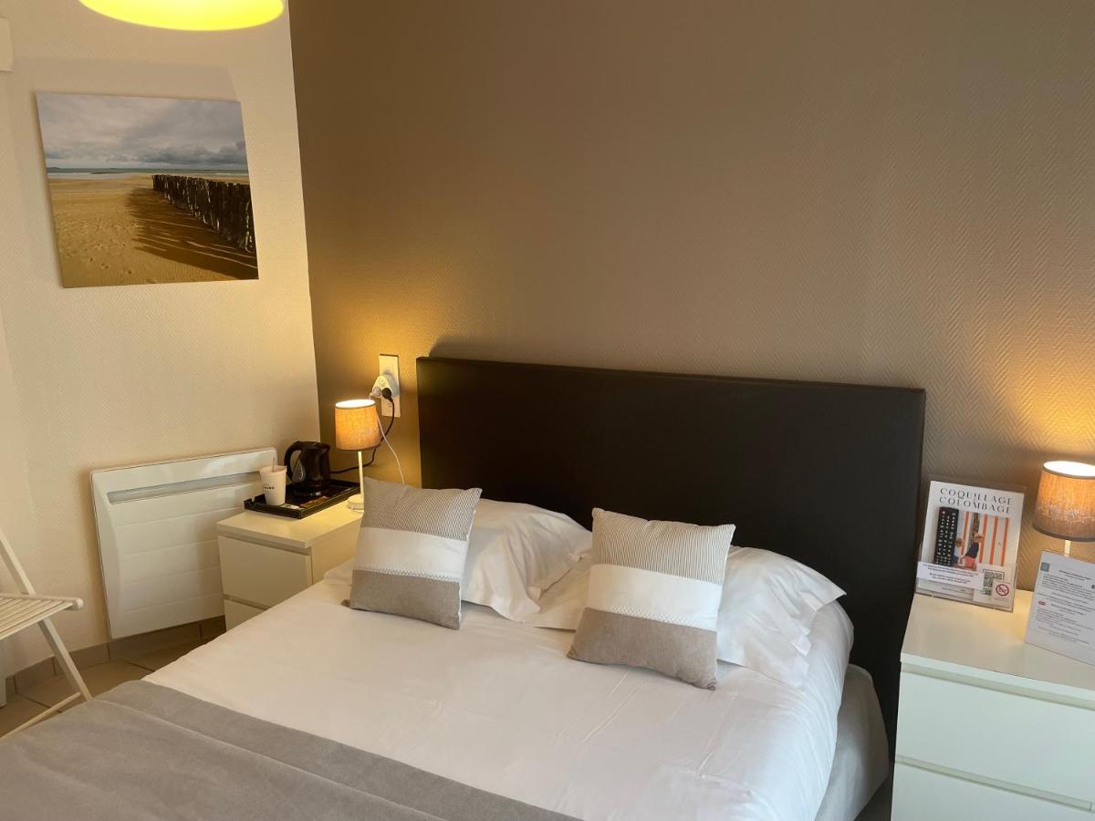 Hotel De La Plage Houlgate Bagian luar foto