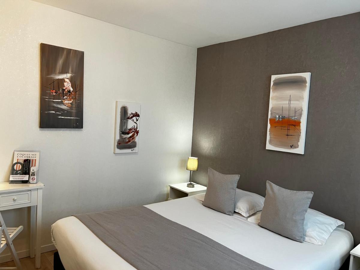 Hotel De La Plage Houlgate Bagian luar foto